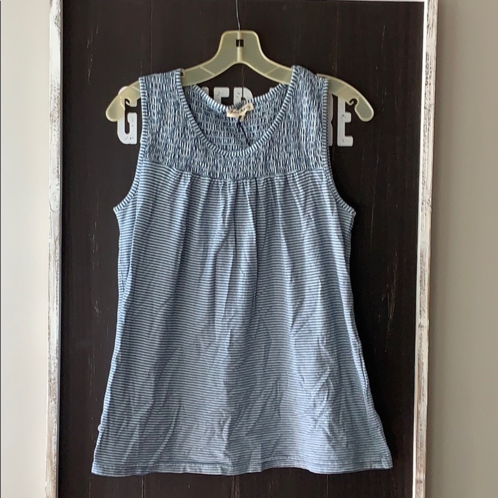 Blue and white striped sleeveless top